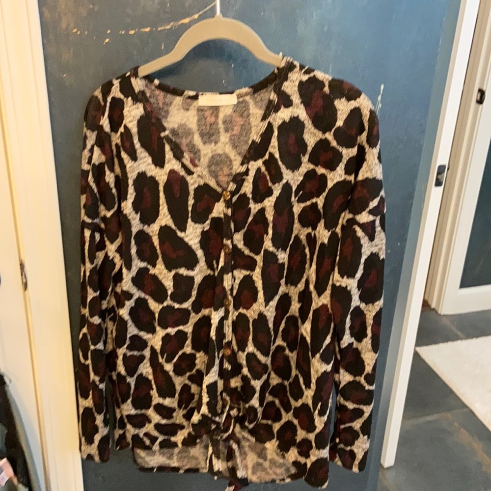 long sleeve lightweight sweater. Size medium but very roomy.